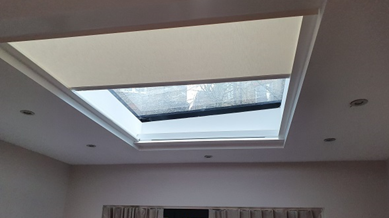 Small to medium Apollo solar battery powered electric roof lantern blind.