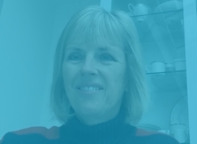 Katheryn indoors with a glass cabinet behind her, overlaid in WindowTreat blue to mark her success story.