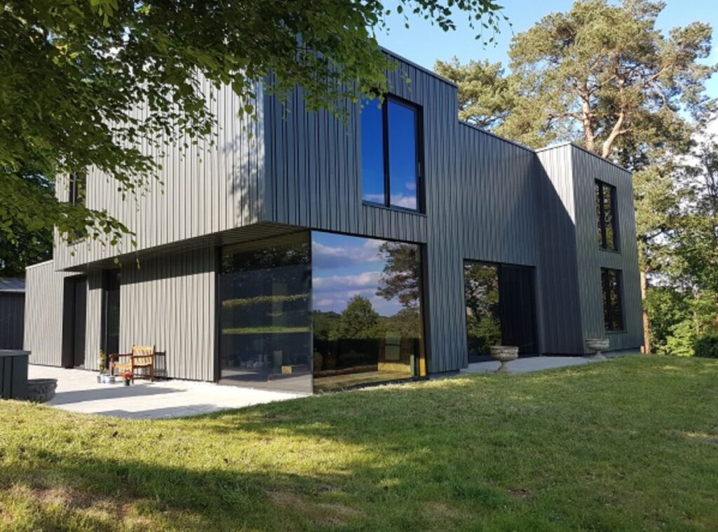 Architecturally designed home with large windows treated using 3M Prestige 40 EXT to reduce solar heat gain.
