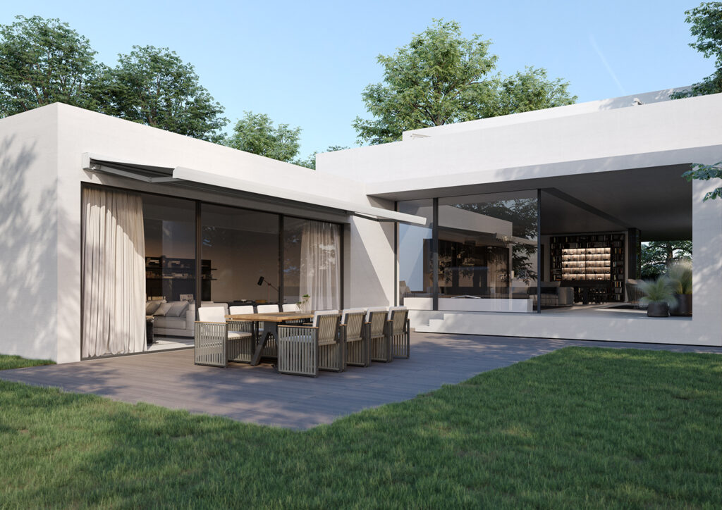 Modern patio with a Sol-Pro electric retractable awning extended above a dining area, providing shade and comfort.