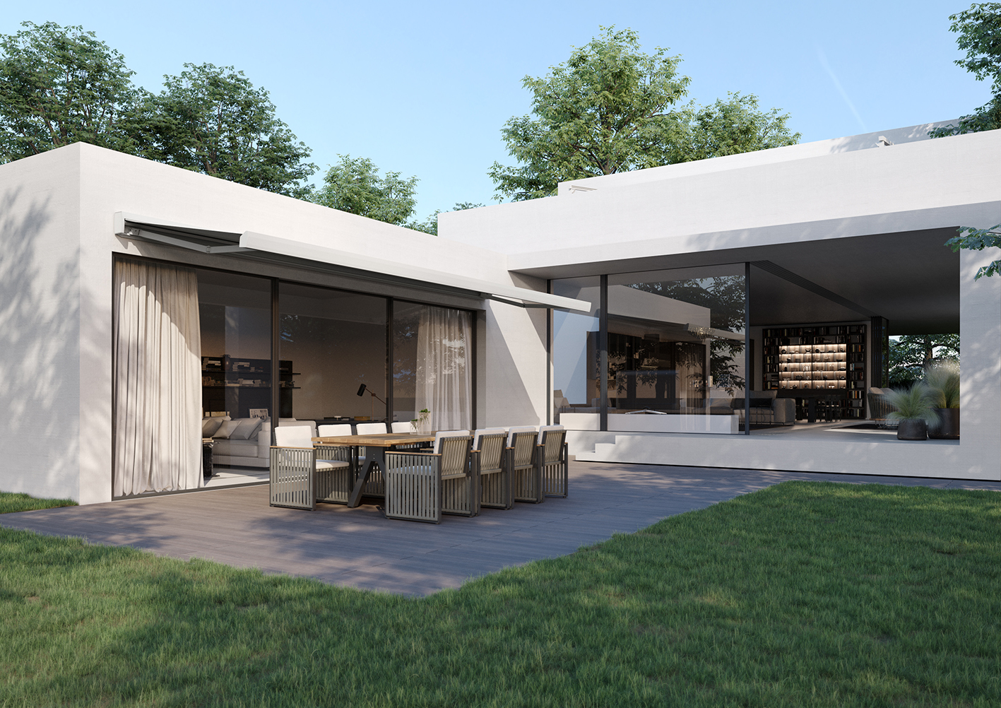 Modern patio with a Sol-Pro electric retractable awning extended above a dining area, providing shade and comfort.