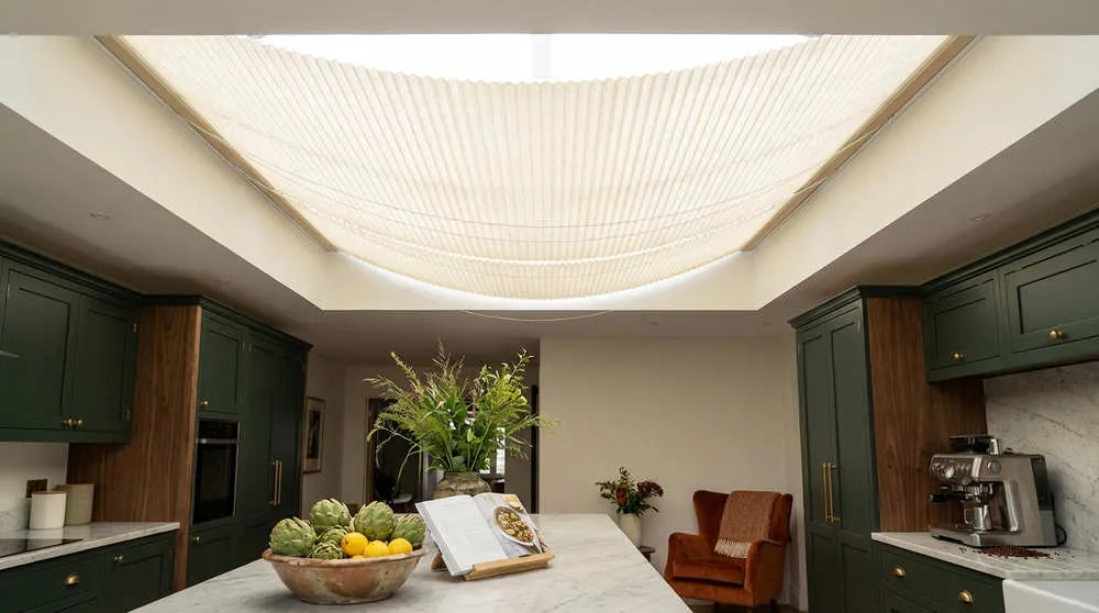 The unfortunate "sack of potatoes" effect. Cheaper systems often use inferior fabrics and tensioning cords that sag over time, ruining the look of a space.