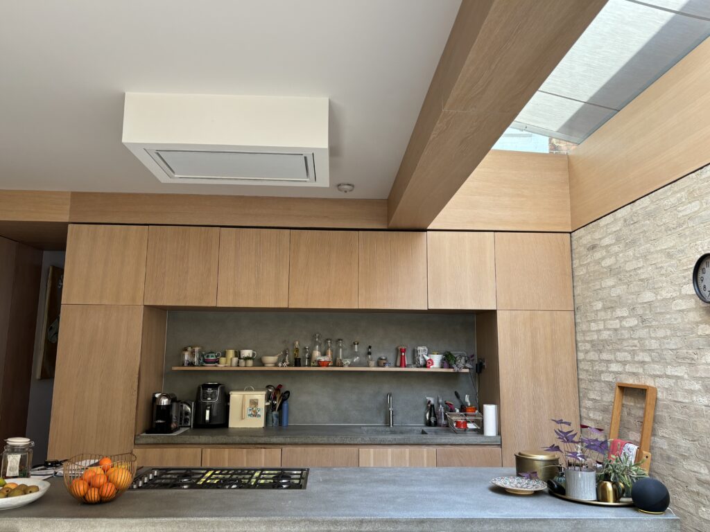 A different angle showing the cassette awnings extended above the side return glazing to provide shade.